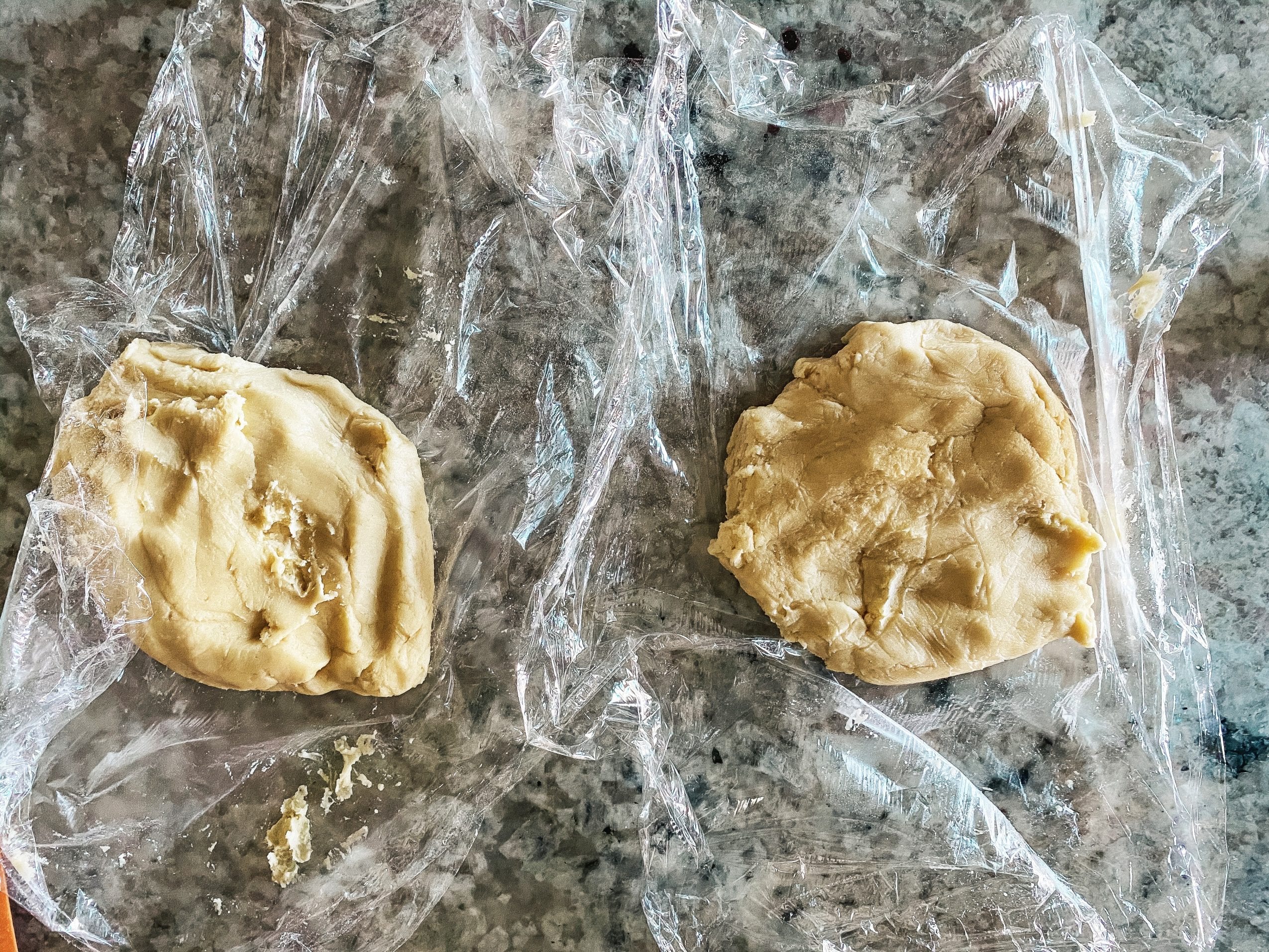 prepping the shortbread cookie dough in plastic wrap